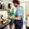 a couple cooks in their kitchen