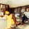 residents sit in lobby in front of elevators