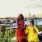women have wine on rooftop with views of Washington, DC