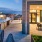 Rooftop patio with bbq area and fire pit overlooking the city with plenty of seating